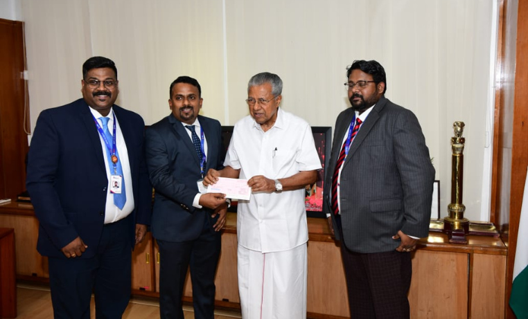 RBL Bank Employees Presenting Cheque for Wayanad Rehabilitation