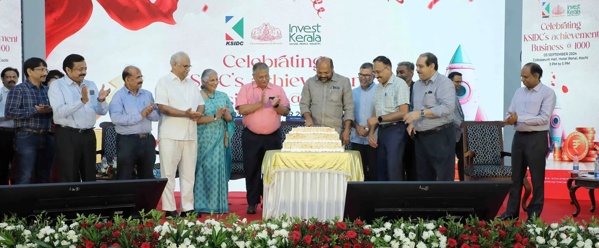 Industries Minister P Rajeeve cuts a cake on the occasion of KSIDC