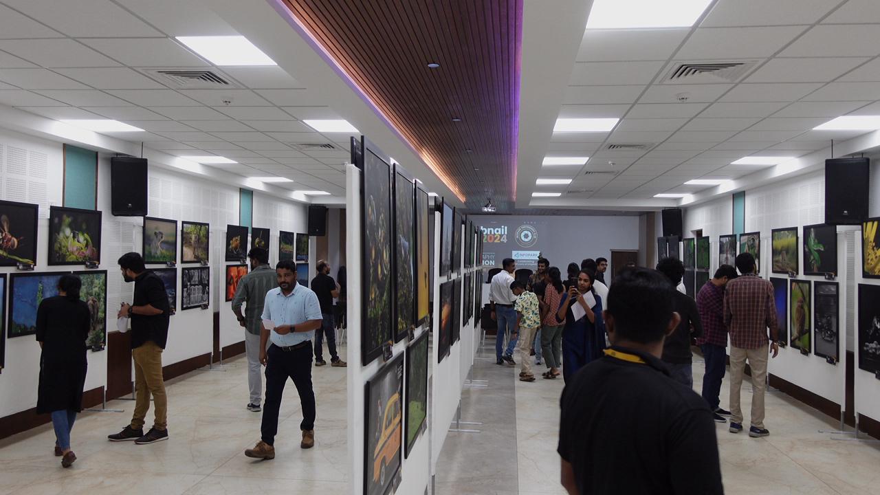 Visitors captivated by the depth  of photographs at the exhibition organised by Infopark and Infopark Photography Club